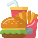 A hamburger with a side of fries served in a cup, highlighting food and beverage SEO services.  